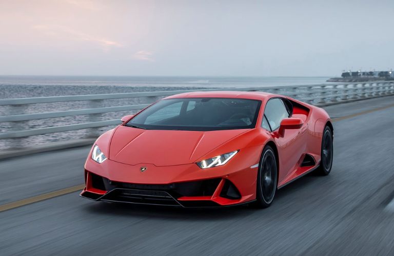 2023 Lamborghini Huracan EVO beside a water body